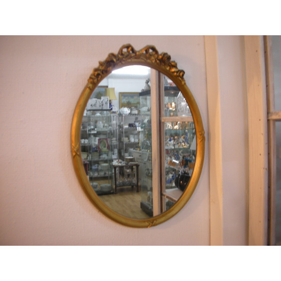 Mirror in gilded in wooden frame, 33.5x25.5 cm