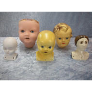 5 various doll heads