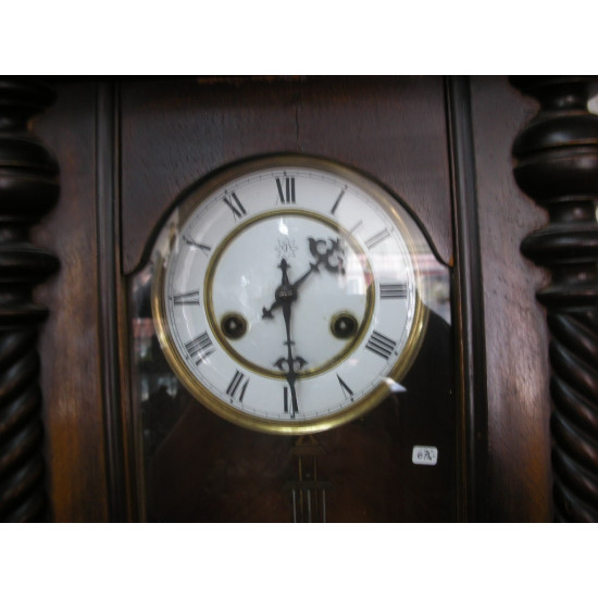 Junghans wall clock in nut wood, 100x36.5x17